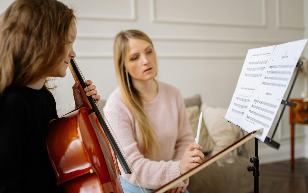 A young student intently practicing a complex musical score during an advanced lesson.