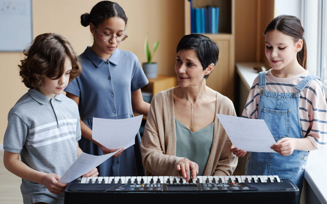 A mother helping her young daughter hold a beginner violin properly during home practice.